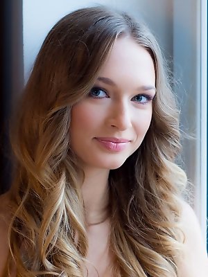 An interesting study of sensual female curves and artistic compositions by the window with the sweet-smiling Amy Moore.